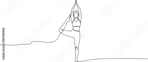 Woman doing yoga on one leg.