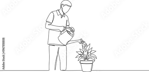 Man watering potted house plant.