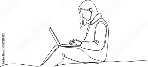 Woman sitting with laptop computer outside.