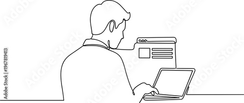 Man working on laptop computer.