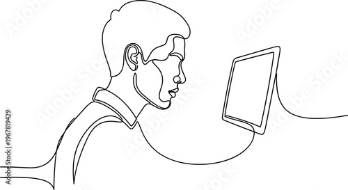 Man looking at a tablet screen.