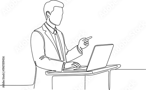 Businessman working on laptop computer.