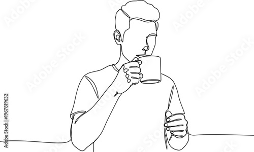 Man drinking from a mug.