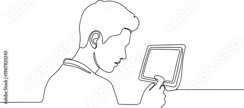 Man looking at a tablet device.