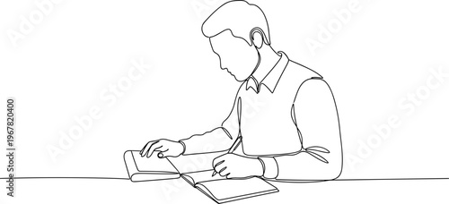 Man sitting at desk with laptop.