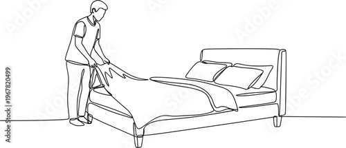 Man making bed with sheets.