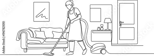 Woman cleaning with vacuum cleaner indoors.