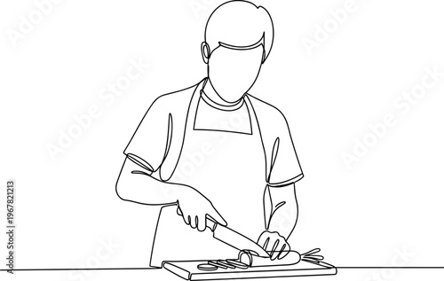 Man cutting food on a board.