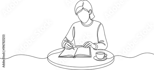 Woman sitting at table writing book.