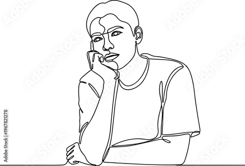 Young man talking on phone.