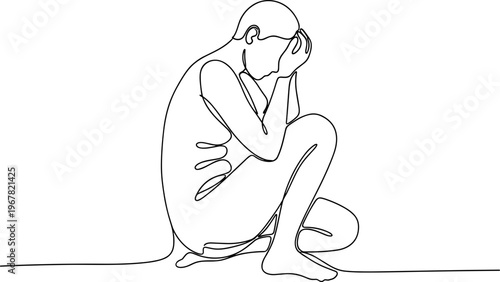 Sad woman sitting alone depressed.