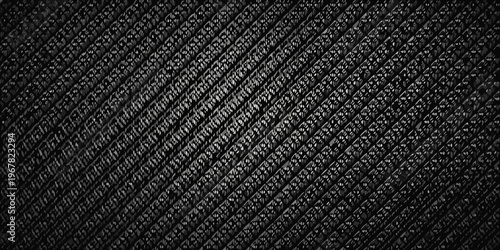 Close up of a dark textured surface resembling woven fabric or netting