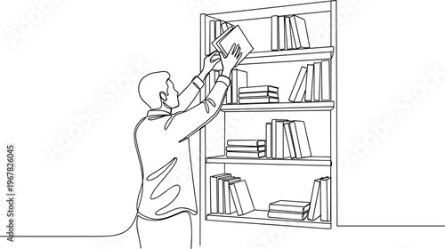 Man taking book from shelf.