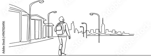 Man walking on city street alone.