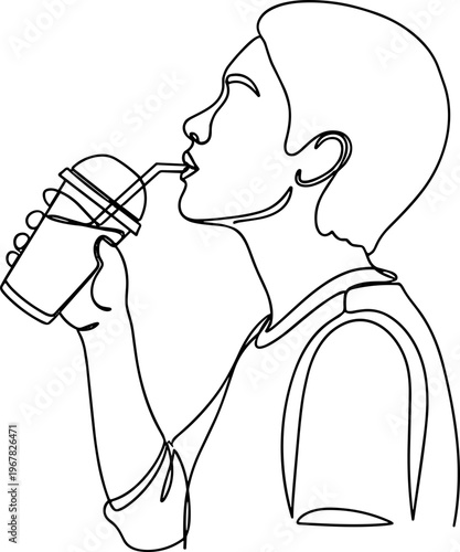 Boy drinking from a cup.