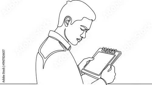Man holding a spiral notebook.