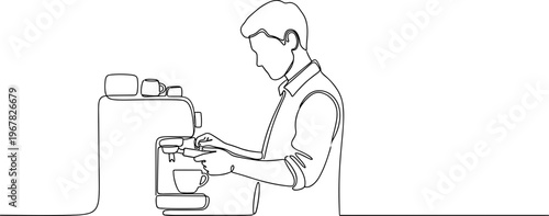 Man using a coffee machine.