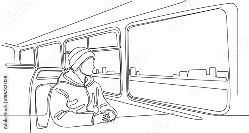 Person sitting on a bus seat.