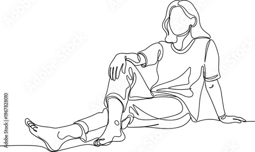 Woman sitting on floor with prosthetic.