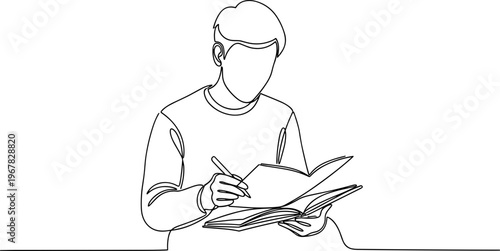 Man writing in a notebook.