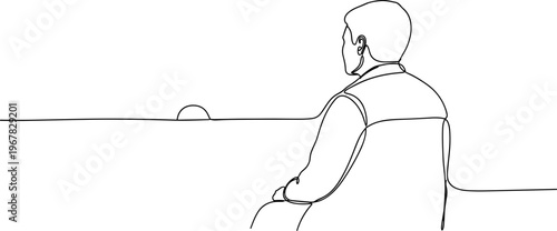 Man sitting at a table alone.