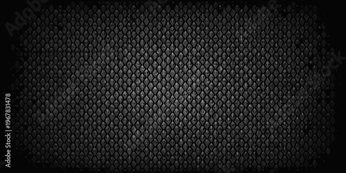 A dark textured background resembling reptile scales or diamond plating