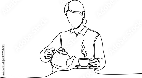 Woman Pouring Tea into Cup.