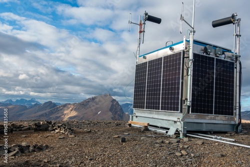 Solar Powered Automated Weather Monitoring Station. Tangle Ridge Mountain Peak above Columbia Icefields. Banff and Jasper National Park Boundary Landscape