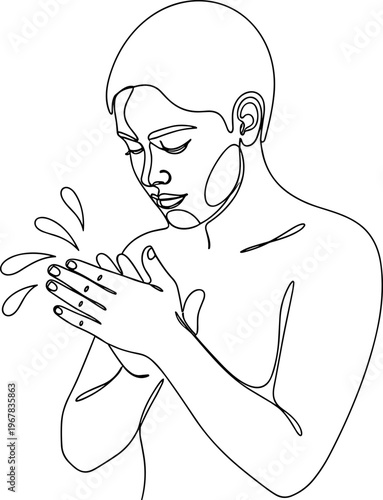 Woman applying perfume to her neck.