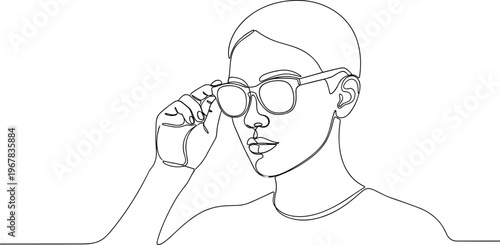 Woman Adjusting Glasses on Face.
