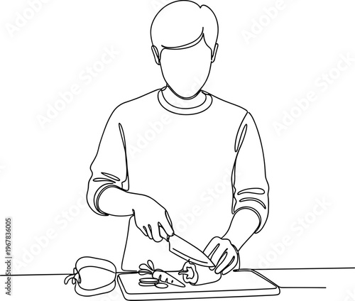 Man cutting vegetables on a board.