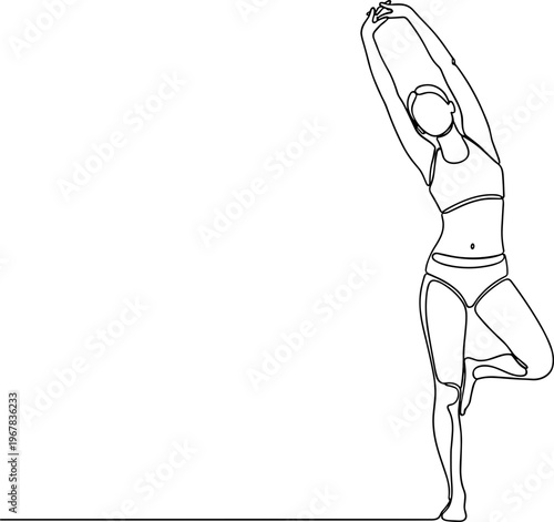 Woman in yoga pose standing balance.