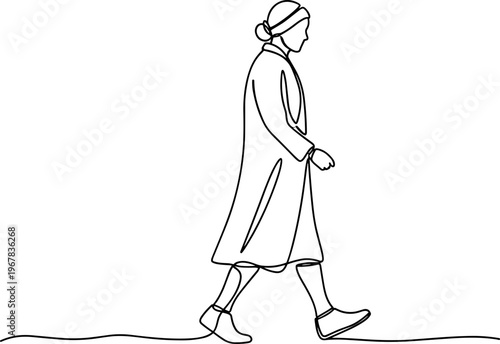 Woman Walking Alone in a Coat.