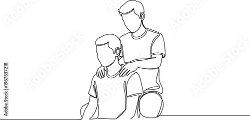 Man comforting a young boy.