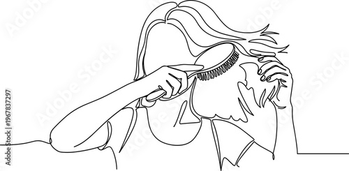 Woman brushing her long hair.