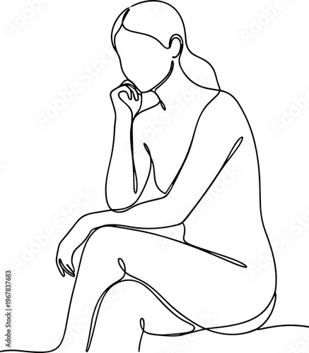 Woman sitting in contemplative thoughtful pose.
