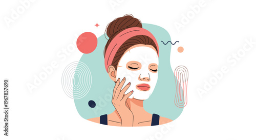 Beautiful young woman with her hair in a bun wearing a white sheet mask during her relaxing facial skincare routine at home.