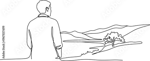 Man looking out at scenic landscape.