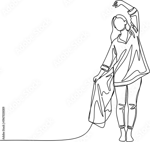 Woman in casual clothing dancing freely.