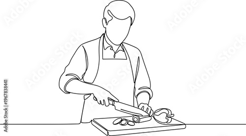 Man cutting food on a board.