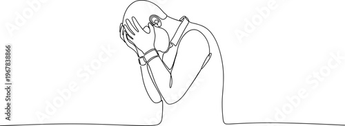 Sad woman covering her face.