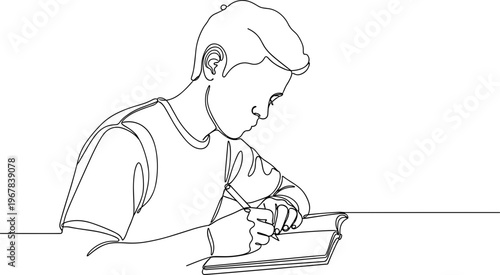 Young man writing on a notebook.