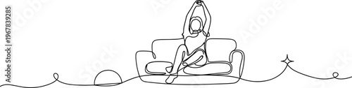 Woman sitting on couch relaxing alone.