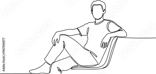 Man sitting on chair relaxed.