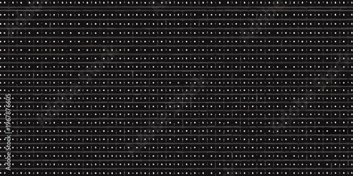 A densely packed repetitive pattern of small white rectangles on black