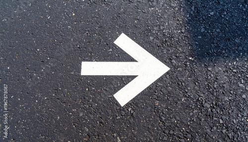 White arrow right asphalt road marking