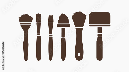 A collection of various paint brushes in a flat, dark brown, minimalist style