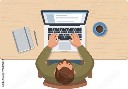 Man sitting at desk working on laptop with coffee and notebook