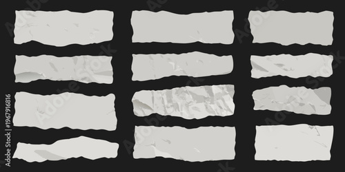 Collection of torn paper pieces against a dark background