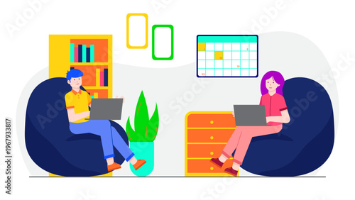 Two employees sitting in beanbags and working on laptops in a cozy office relaxation corner